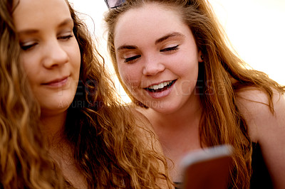 Buy stock photo App, phone and smile with girl friends outdoor in summer for browsing, communication or social media. Contact, mobile and text message with happy people at beach for holiday, travel or vacation
