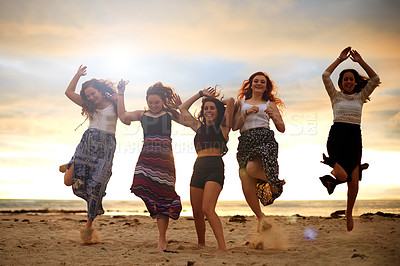Buy stock photo Friends, jump and teen group on beach for travel, energy and freedom together at sunset. Happiness, fun and girls trip with people in nature for adventure, holiday and outdoor summer for bonding