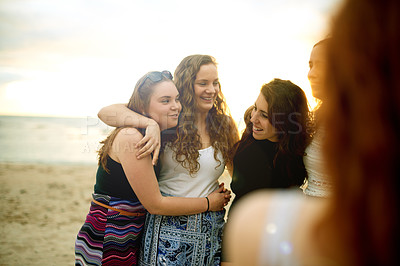 Buy stock photo Beach, hug and women with vacation, travel and support with celebration, tourism and reunion. People, ocean and friends with embrace, smile and tropical island with weekend break, seaside or Zanzibar