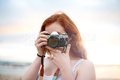Buy stock photo Photography, camera and woman on beach for travel, vacation or getaway with content creation. Hobby, influencer and female person with lens equipment for tropical holiday or weekend trip by seaside.