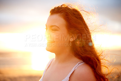 Buy stock photo Sunset, travel and woman on beach for vacation, holiday or getaway with calm, peace or self reflection. Happy, evening and female person by ocean for seaside weekend trip or spring break for relax.