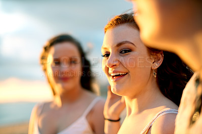 Buy stock photo Beach, portrait and woman with vacation, friends and bonding together with smile, sunset and relaxing. Face, happy people and group with summer holiday, tropical island and weekend break in Zanzibar