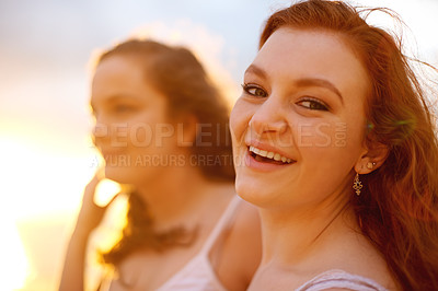 Buy stock photo Beach, sunset and women with vacation, portrait and bonding together with social gathering. Ocean, tropical island and people with seaside, travel and summer holiday with smile, friends or Zanzibar