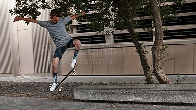 Buy stock photo City, jump and man with skateboard, practice and skills for street skating, tricks and stunts for game. Outdoor, skateboarder and person with energy for competition, speed or action for extreme sport