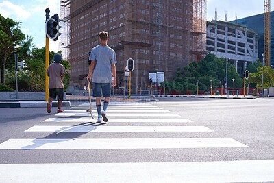 Buy stock photo Travel, skateboarder and man in city, road and back of athlete with skateboard, break and competition. Outdoor, walking and person with hobby of extreme sports, training and commitment for skater