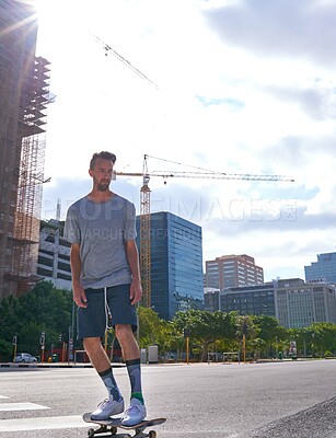 Buy stock photo Man, skateboard and outdoor on crosswalk in city, transport and street for adventure in summer. Person, skater and board for extreme sports, fitness and workout with balance on urban road in USA