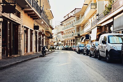 Buy stock photo Vintage, street and buildings in city outdoor with architecture, travel path and history tourism of location. Urban, business and storefronts for traditional culture, holiday landmark and destination