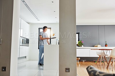Buy stock photo Man, kitchen and pancakes in home for breakfast, cooking and vegan food for sweet treat. Alone, morning and baking ingredients on holiday for male person, flip and bachelor for nutrition and meal