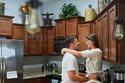 Buy stock photo House, love and couple in kitchen, smile and bonding together with relationship, romance and joy. Apartment, embrace and man with woman, marriage and morning with happiness, weekend break or cheerful