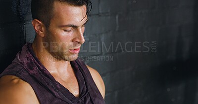 Buy stock photo Man, sweating and break from exercise at wall for endurance training, fitness challenge or exhausted. Space, athlete or resting in sports club for intense workout, overworked or fatigue with recovery