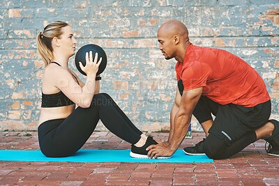 Buy stock photo Ball, fitness and coach with woman for workout, exercise and on yoga mat for sport. Partnership, personal trainer and athlete on break by brick wall at gym for wellness, training or healthy lifestyle