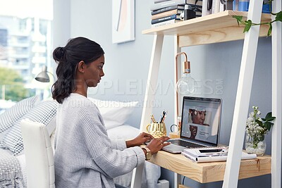 Buy stock photo Computer, typing and woman at desk in home for freelance creative web development business. Technology, research and Indian female copywriting designer working on online project with laptop at house.