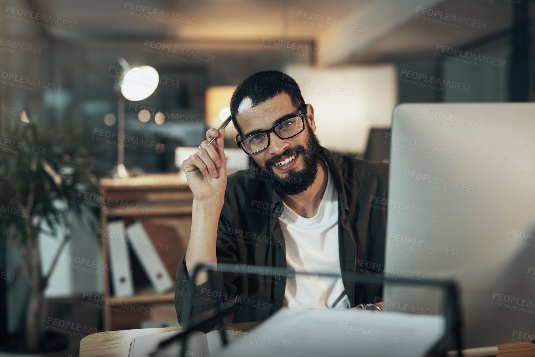 Buy stock photo Happy man, portrait and night with creative on computer for digital design, project deadline or web service at office. Male person, employee or designer working late with smile for creativity process