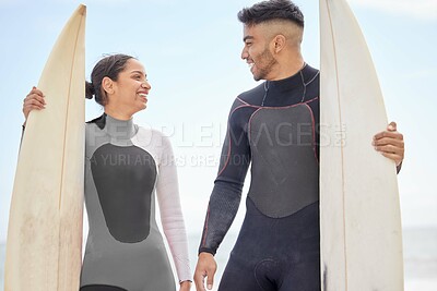 Buy stock photo Happy, couple and love by beach with surfboard for training or workout for competition, adventure and water sport. Surfers, beachwear and board for active fitness by ocean coast in California