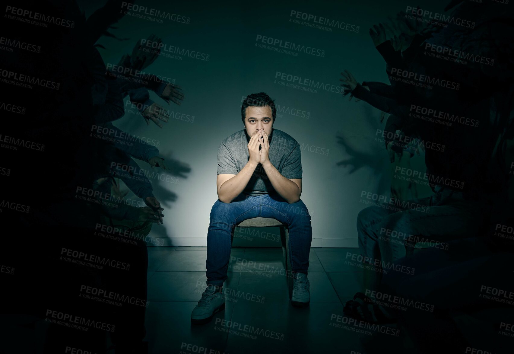 Buy stock photo Portrait, psychology and shadow with man in studio on dark background for rehabilitation. Bipolar, fear and mental health with schizophrenia patient in spotlight for healthcare or medical assessment