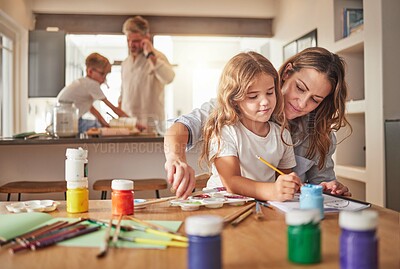 Creative, art and family painting and learning at home for education, design and relax together for child development. Happy, inspiration or sketch with mom and girl at table for peace and motivation
