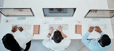 Top view, call center and consulting doing customer service, headset and computers doing typing in office. Business, coworkers and consultant workers doing client support, telemarketing and speak.