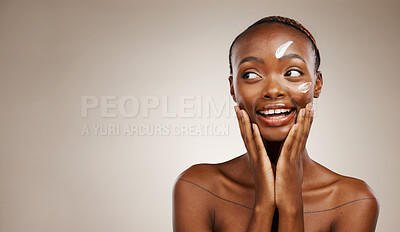 Buy stock photo Beauty, smile and black woman with cream, thinking or dermatology on a grey studio background. African person, girl or model with creme, aesthetic or cosmetics with skincare mockup space or self care in