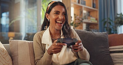Buy stock photo Indian woman, home and excited with video game in sofa at living room for fun and esports challenge . Female person, happy and smile with joystick or controller on couch for entertainment on break