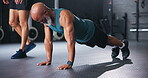 Personal trainer, senior people and push up at gym with workout, guide and teaching for fitness. Coach, support and strong at class for training, learning or exercise at wellness club in retirement