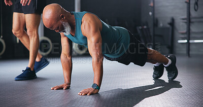 Buy stock photo Personal trainer, senior people and push up at gym with workout, guide and teaching for fitness. Coach, support and strong at class for training, learning or exercise at wellness club in retirement