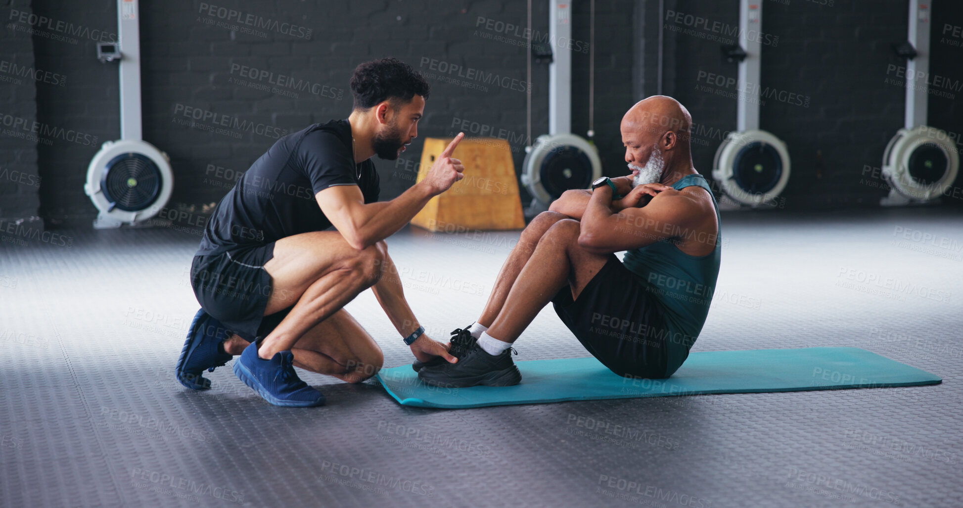 Buy stock photo Personal trainer, senior people and sit up at gym with stomach, guide and motivation for fitness. Coach, muscle and abdomen at class for training, learning or exercise at wellness club in retirement