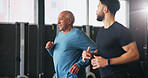 Personal trainer, senior man and running at gym for fitness with workout, guide and teaching with smile. Coach, cardio and class for training, learning and exercise at wellness club in retirement