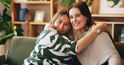 Buy stock photo Hug, portrait and smile of mother with daughter on sofa in living room of home for bonding or love. Safety, security and visit with happy family in apartment together for relax, support or trust