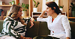 Senior woman, daughter and conversation in home, bonding or catch up chat with connection on sofa. House, Mothers day and female people talking with communication and healthy family relationship