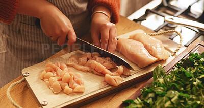 Buy stock photo Hands, chicken and cutting board in kitchen, home and meal prep with knife, poultry and cooking healthy food. Person, chef and tools for organic meat, nutrition and diet for wellness at apartment