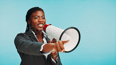 Buy stock photo Business, black woman and voice on megaphone in studio for announcement, office broadcast and celebration speech. Mockup space, excited and employee pointing to incentive winner on blue background