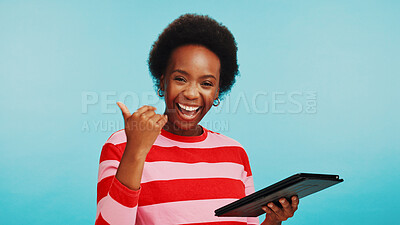 Buy stock photo Studio, black woman and portrait with tablet for thumb up, education results and excited for good news. Mockup, student and tech with approval sign for college acceptance, happy and blue background