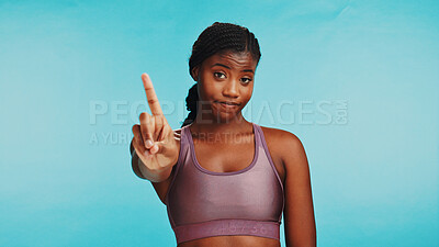 Buy stock photo Portrait, stop and black woman in studio, fitness and warning on blue background. African person, personal trainer and model with gesture, fast food rejection and advice for mistake or prevent injury