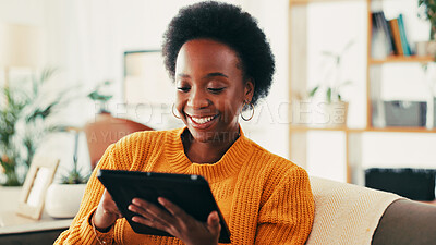 Buy stock photo Home, streaming and woman with tablet, smile and subscription to app for entertainment and living room. House, happy and black person with tech for movies, watching or membership on website in lounge