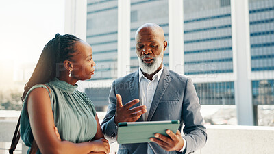 Buy stock photo Tablet, manager and business people on rooftop in discussion for company investment with stocks. Digital technology, strategy and mentor with financial advisor for online with risk management in city