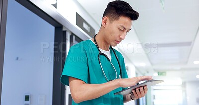 Buy stock photo Nurse, tablet and Asian man on internet for healthcare update, report and check records for telehealth. Technology, reading and serious medical worker with research, wellness and schedule in clinic