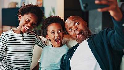Buy stock photo Selfie, funny face and dad with children on sofa for social media, profile picture and online post in home. Happy family, silly and father with kids take photo for bonding, fun and goofy together