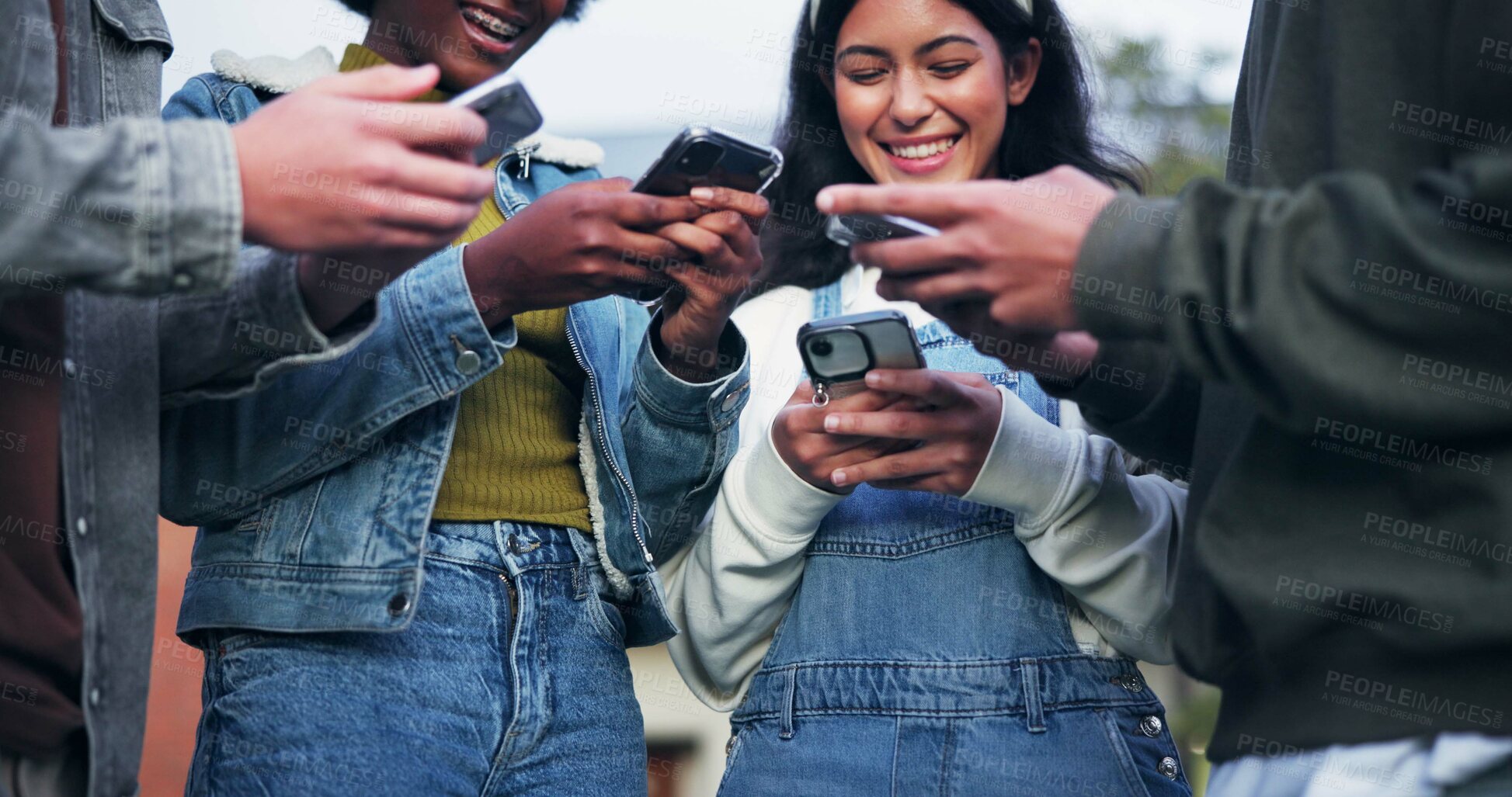 Buy stock photo Phone, group and friends networking on social media, mobile app or network for streaming online. Community, people and students sharing data, music or internet news in circle for communication