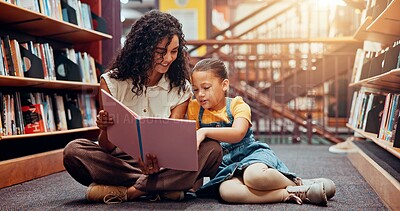 Buy stock photo Child, learning or teacher reading book for storytelling, development or growth in school. Teaching, tutor or woman with girl or kid in library for literature lesson, fairy tale or education support