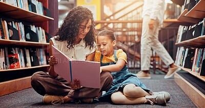 Buy stock photo Kid, learning or teacher reading book for storytelling, development or growth in school. Teaching, tutor or woman with girl or child in library for literature lesson, fairy tale or education support