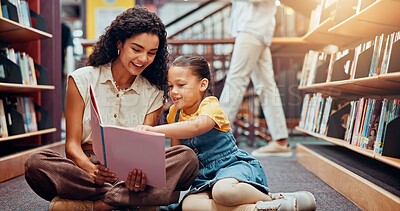 Buy stock photo Kid, help or teacher reading book for learning, child development or talking in school. Teaching, smile or woman with girl or student in library for literature lesson, fairy tale or education support