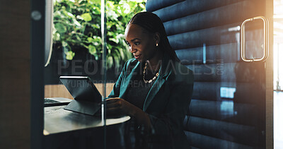 Buy stock photo Tablet, office and businesswoman in cubicle for company budget review and accounting news. Technology, hybrid work booth and African financial manager with online investment report or reading update