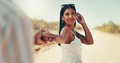 Buy stock photo Smile, woman and holding hands for safari travel with love, summer holiday and romantic adventure. Happy, couple and date with commitment for wilderness vacation, desert getaway and explore Africa
