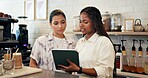 Women, waitress and meeting on tablet at cafe of menu update, online orders and inventory management. Staff, digital and website reviews, stock information and store checklist of hospitality industry