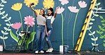 Outdoor, artist and women with mural, selfie and friends with smile for painting, online and social media. Bonding, painter and people with photography for wall art, post and creativity with decor