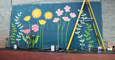 Buy stock photo Creative, ladder and painting with mural on wall on street for decoration, improvement or renovation. Background, DIY and flowers outdoor for community art project, design or neighborhood upliftment