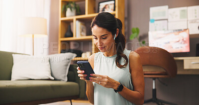 Buy stock photo Woman, smartphone and earphones with exercise break in house, listen to music or social media comment response. Audio tech, app or fitness blog with review, post for communication or workout chat