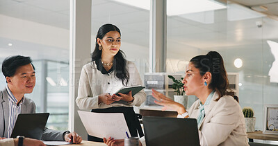 Buy stock photo Collaboration, documents and feedback with business people in office for development or discussion. Laptop, meeting and tablet with team in corporate workplace for conversation, strategy or update