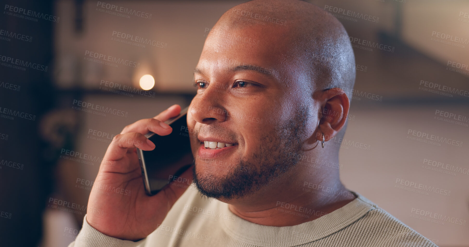 Buy stock photo Man, night and phone call in home for communication, conversation or talking for story. Ideas, feedback and male person thinking with smile or news in living room, lounge or house for chat on mobile