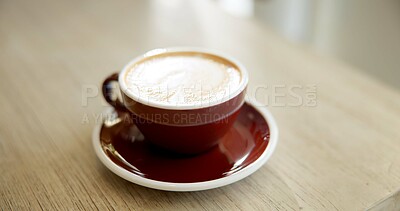 Buy stock photo Cafeteria, drink and coffee on counter for serving caffeine beverage, espresso and latte art. Hospitality, small business and cappuccino with foam in mug on table for restaurant, diner and service